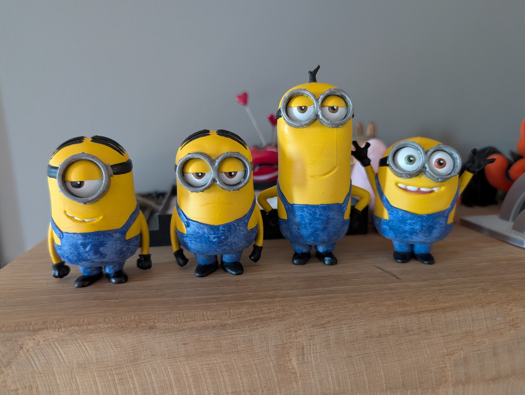 Picture showing 4 Minion characters after painting and finishing