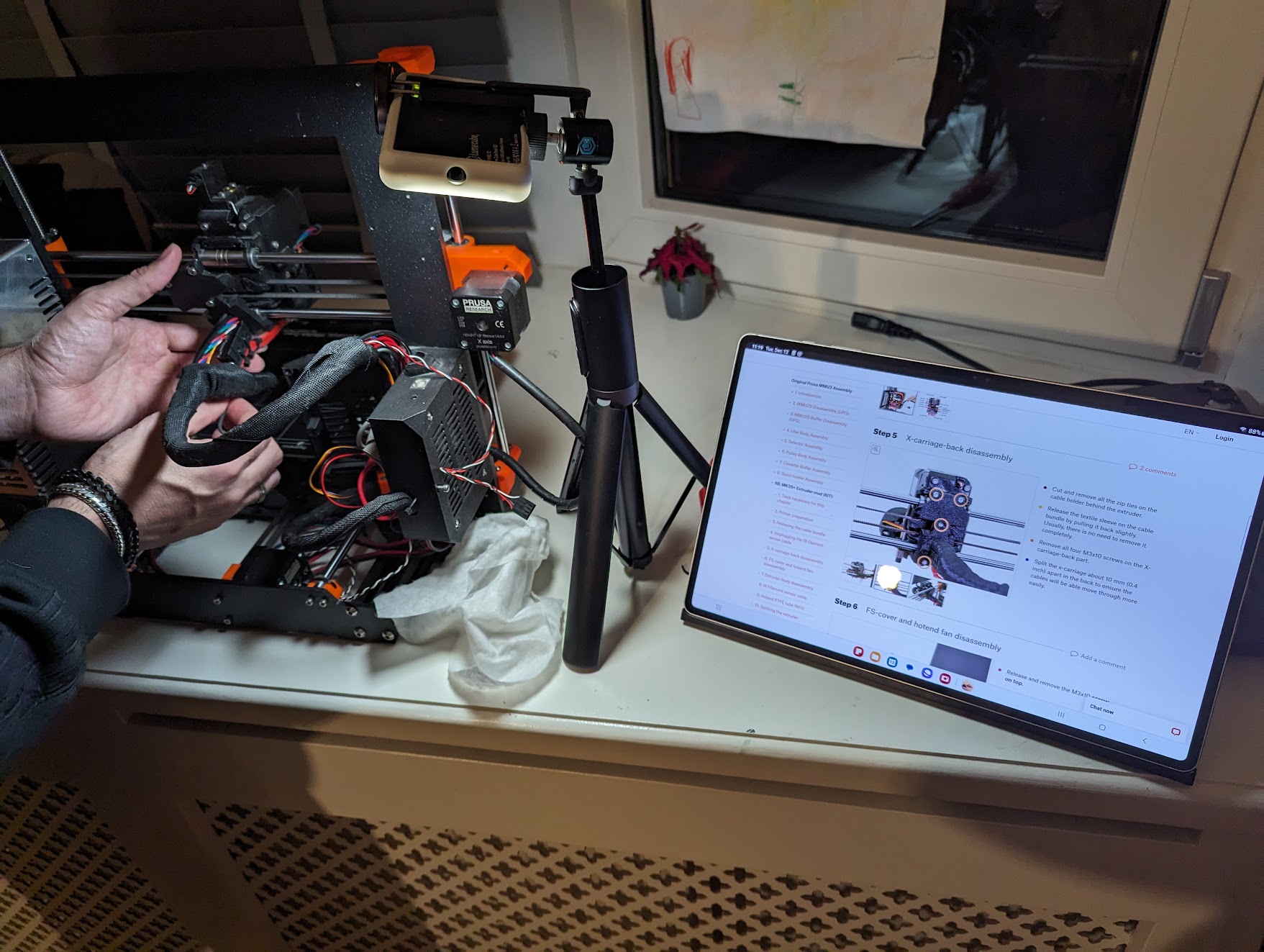 Picture showing a 3D printer under maintenance or upgrade